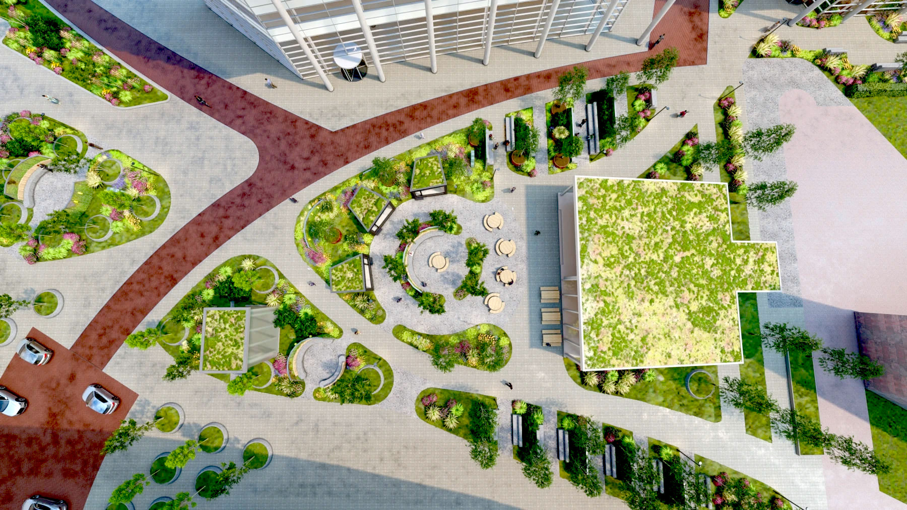 © MAAQ | Begrünter Innenhof mit Sitzbereichen und Wegen im Bright Offices Amsterdam aus der Vogelperspektive